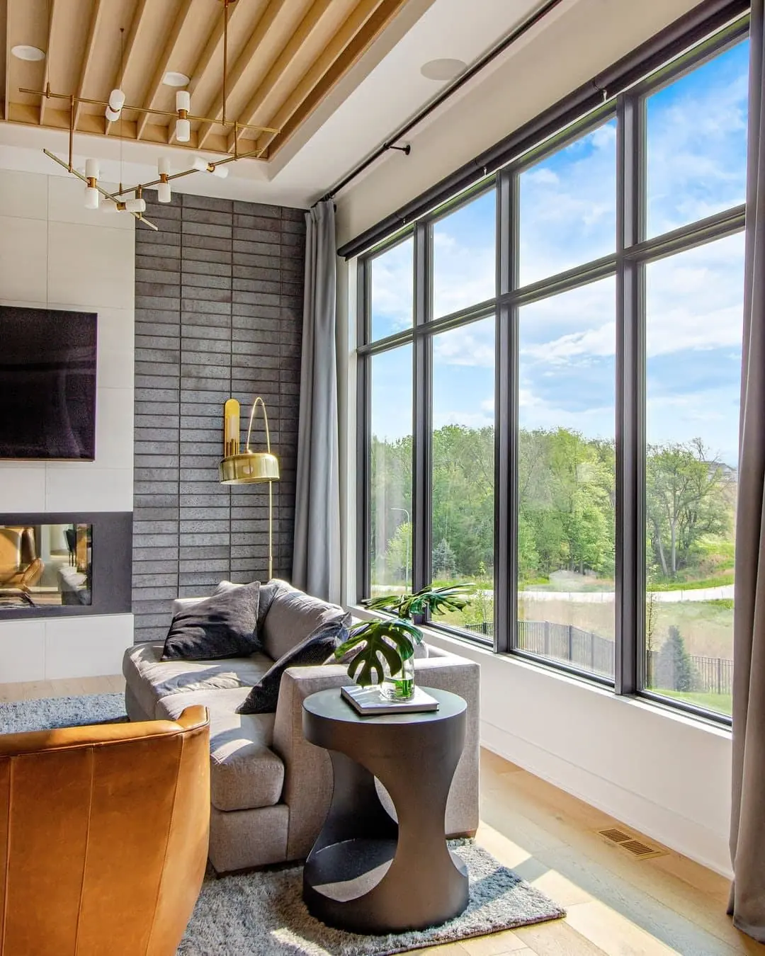 Installer fitting a replacement window in a home